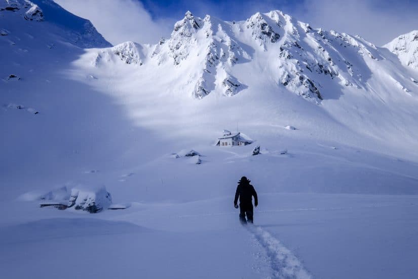 person walking in the snow in Romania